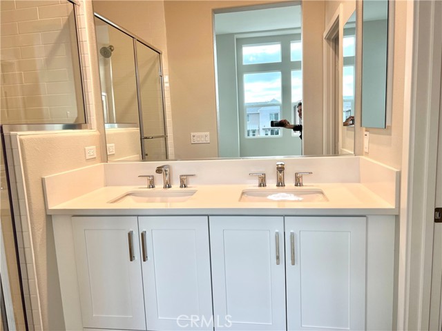 Primary Bathroom with double sink vanity and walk in shower!