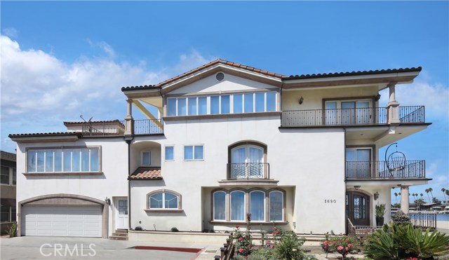 5690 E Bay Shore Long Beach, California First time on a market in decades! One of the best locations on the Peninsula. Steps to the beach. Unobstructed views of the Bay and a wonderful rose garden. Watch holidays’ fireworks and Christmas parades from your front porch. Enjoy swimming, paddle boarding, walking, running, biking, kayaking, boating and many more amazing neighborhood activities. Short walk to a basketball court, children’s playground, restaurants, shops, a library, etc. Fantastic resort style living. Short walking distance to a local marina with different sizes of boat slips for rent. Do not miss your lifetime opportunity. This house can be used as an SFR or a duplex. Main house has 4 spacious bedrooms, 5 bathrooms, a library/office, an elevator, 2 fireplaces, a gourmet kitchen, lovely family rooms and a hobbies room, 2 cars garage, plenty of storage, and many other amazing amenities. Back unit has a spacious living room with a bay view, a kitchen, one bedroom, one bath and a separate entrance. Come and see it for yourself. Sizes of the lot and the property itself are taken from appraiser's records. Price is NOT based on sqft. Buyer(s) to verify if important. The listing is shown in LA Haven Lifestyle Magazine