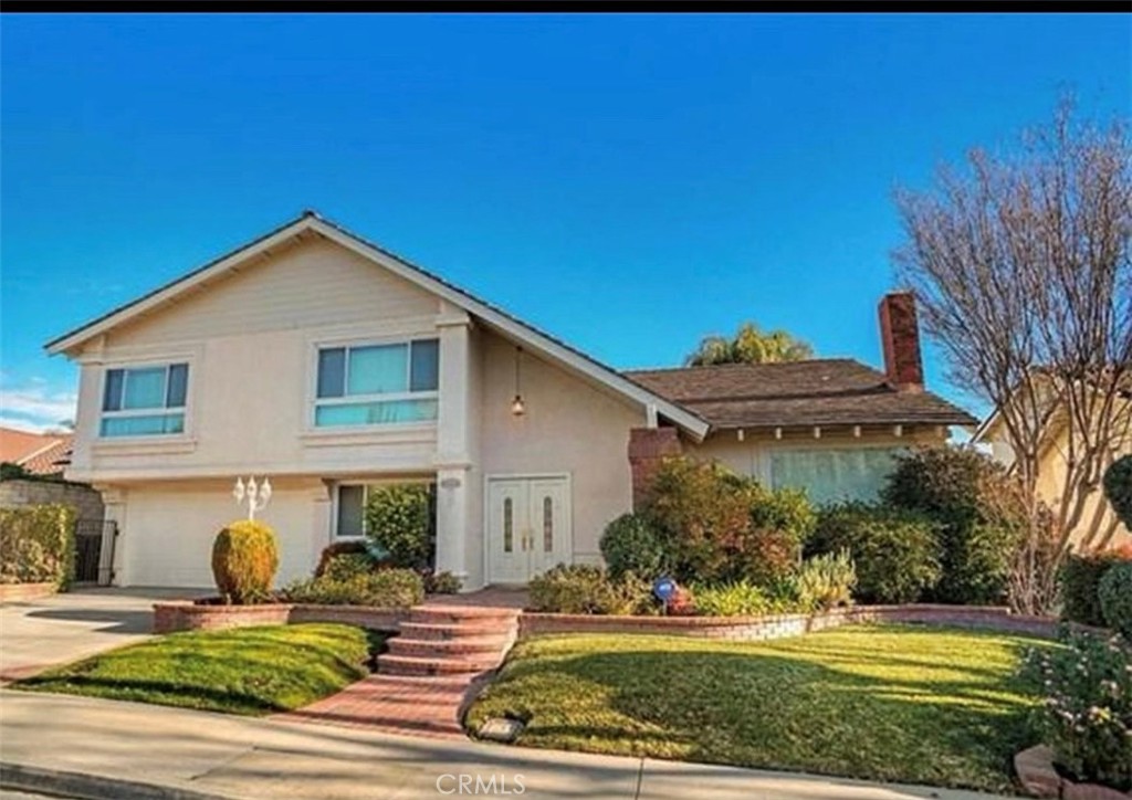 Welcome to your dream home in Valencia Hills! This beautifully designed 4-bedroom, 2.5-bath residence boasts over 2,800 sq ft and features an open floor plan perfect for modern living and entertaining.
Step inside and be greeted by soaring cathedral ceilings and generous natural light that flows throughout the living and dining areas. The heart of the home is the updated center island kitchen, featuring stainless steels appliances, a breakfast bar and an abundance of cabinets. Enjoy the large family room, which overlooks the beautiful back yard ,a true private oasis with a sparkling pool, lush grass area, and a charming gazebo—ideal for outdoor dining, entertaining, or simply relaxing in the shade. 
Downstairs, you'll find a convenient first-floor bedroom—perfect for guests, a home office, or multigenerational living. Upstairs, the primary suite is a true retreat, complete with two closets and a very large bathroom which features a spa tub, double vanity and oversized shower.
 The HOA offers a  clubhouse, junior Olympic sized pool and Tennis/pickleball courts