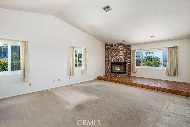 Master bedroom #2 on 2nd level is huge & has fireplace, full bath with dual vanities, & walk-in closet