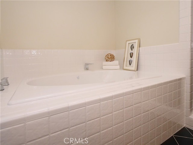 Primary bathroom with a large jetted tub