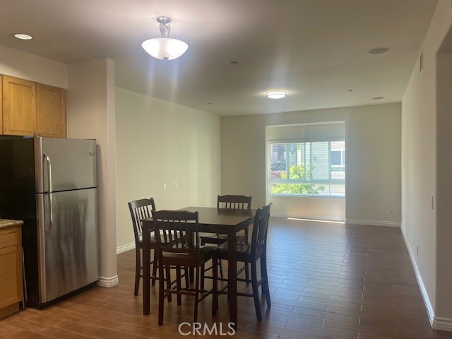 view of breakfast area and living room