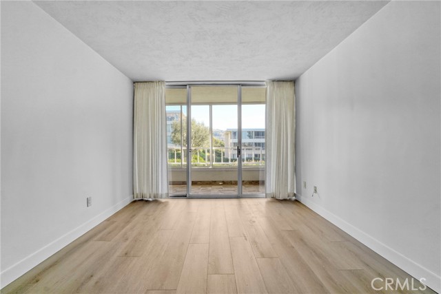Bedroom with Balcony access.