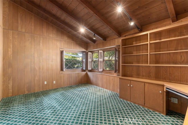 Office/library is a front facing room and located just off of the foyer.