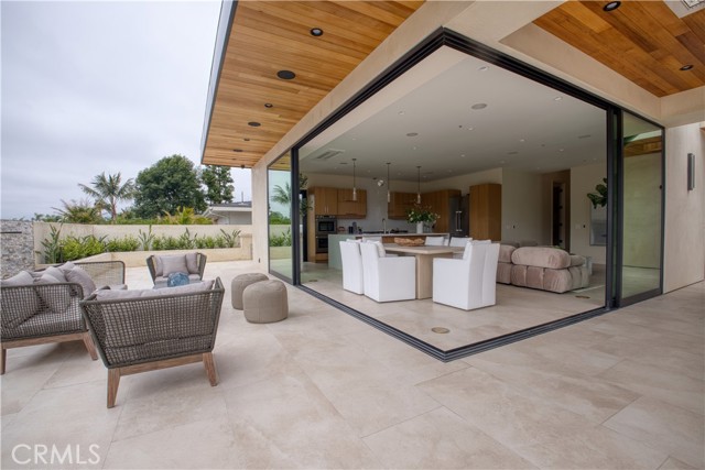 Open this up, slide it all aside, room for large dining tables outside