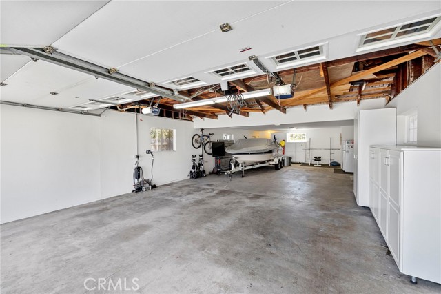4 car tandem garage with plenty of room for boat parking and two electric charges.