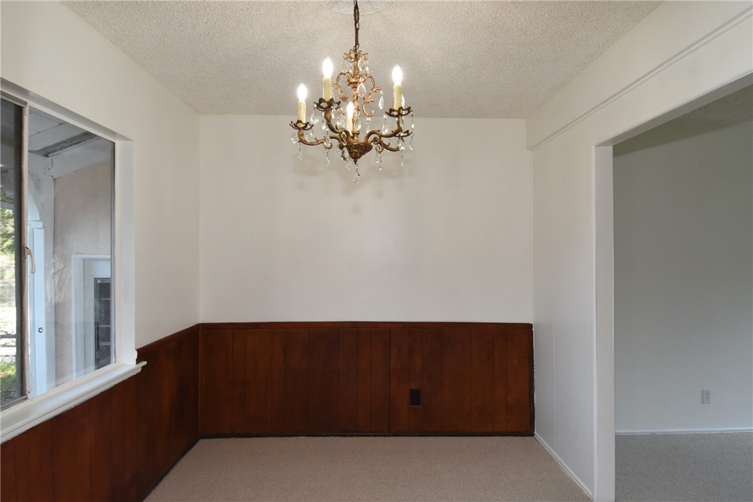 Adorable dining room is perfectly situated between the living room and kitchen