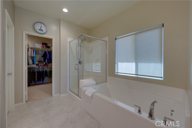 Primary Bath Looking Towards Large Walk-In Closet