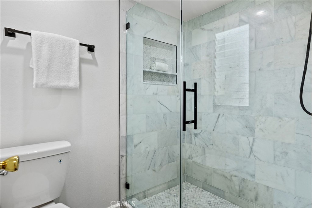 Primary marble tiled shower