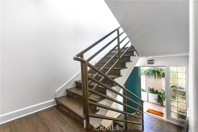 Stairway showing front door, entry