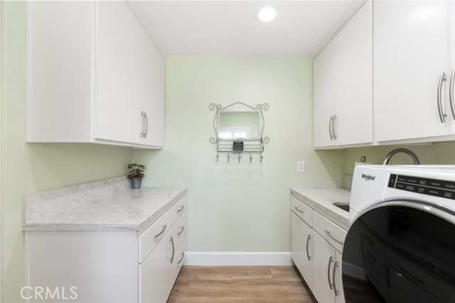 There is a lot of cupboard space and counter tops to work with here. Plus you are going to love having the convenience of a sink right at your disposal.