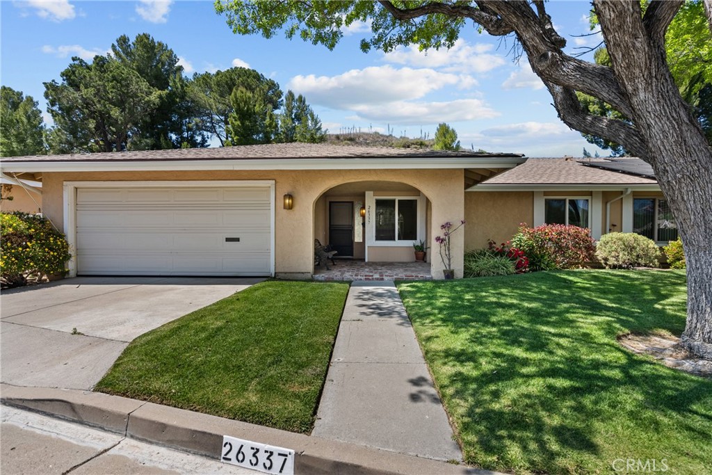 Charming 3-Bedroom Home in Friendly Valley – A Rare Find! Welcome to Friendly Valley — a beautiful, peaceful, and secure 55+ gated community. This is the only single-story 3-bedroom, 2-bathroom home currently available, and it’s full of warmth and comfort! Step into a spacious living room with a cozy fireplace, seamlessly connected to the formal dining room. Glass sliders open to a lovely backyard filled with blooming rose bushes — perfect for relaxing or entertaining. The kitchen features granite countertops and offers a picturesque view of the garden. The primary suite includes an ensuite bathroom and mirrored closet doors. Two additional bedrooms provide flexibility for guests, hobbies, or a home office — one is currently used as a den. A second full bathroom includes a tub for convenience. Wonderful upgrades make this home move-in ready: Double-pane windows, Copper plumbing re-pipe,  Newer HVAC unit and AC compressor, Fresh paint and newer carpet. Enjoy the convenience of an attached 2-car garage.
Friendly Valley offers a lifestyle to love: Golf Course, Olympic-sized Pool & Spa, Active Community Center, 24-hour Guard-Gated Entry.  HOA includes cable, internet, trash, and front yard maintenance, Located close to shopping, restaurants, churches, and easy freeway access — everything you need is nearby. Don’t miss this rare opportunity to own a sweet, move-in-ready home in one of the most desirable communities around. Come see it today!
