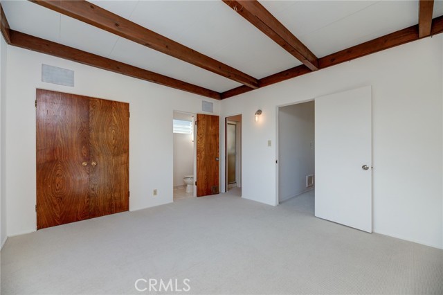 Primary Bedroom with Tree Top Views