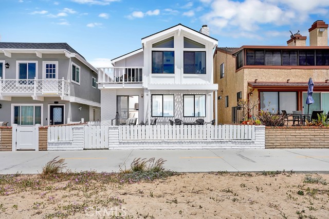 1123 E Balboa Boulevard Newport Beach, California Well-maintained oceanfront duplex with a 4 car garage in the quiet Peninsula Point neighborhood! Enjoy panoramic ocean and Catalina views within the coveted blocks where bay front homes are directly across the street. The downstairs home has 2 bedrooms and 2 bathrooms, new stainless steel refrigerator and a spacious patio for entertaining guests with a view! The upstairs home consists of 3 bedrooms and 2 baths with high vaulted ceilings, a balcony with sweeping ocean views, new carpet and washer/dryer in unit. The large garage fits 4 cars with ample space for bikes, surfboards and has a hook up for a washer and dryer. Located towards the end of the boardwalk allowing for a more quiet atmosphere, there is also a rustic beach volleyball court out front to enjoy with your neighbors. Walk to the Peninsula Point tennis club, the world famous Wedge or local restaurants and shopping on Main Street. Enjoy paradise just in time for the summer, living in one unit while renting out the other!