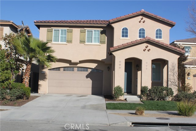 9375 Greenbelt Place Rancho Cucamonga, California Beautiful 5 bedrooms, 3 full baths, and large family home in quiet gated community. Living room, formal dining room, kitchen with granite counter tops and stainless steel appliances open to large family room with eating area, 1 downstairs bedroom, full bath, and tiles and laminate wood floorings on first level. 2nd level with loft, 3 bedrooms plus large master suite with upgraded master bath. 2 car attached garage. Backyard upgraded with drought landscaping, Community pool, spa, and recreation area.