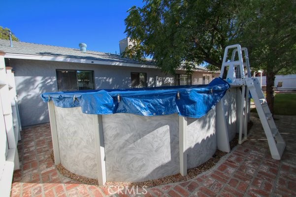 Above ground pool on the patio