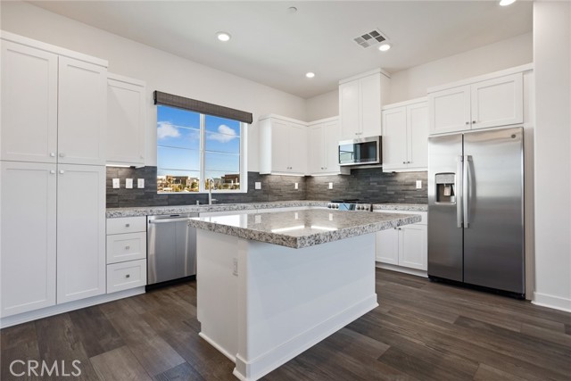 Kitchen with GE Profile Stainless Steel appliances