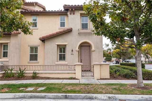 This 3 Bedroom, 2.5 Bathroom end unit in the Magnolia Lane HOA offers convenient access and a well-designed open floor plan. The main level features 9-foot ceilings, shutters, and tile flooring throughout. The custom kitchen boasts an island, granite countertops, and abundant cabinet storage, with a range, microwave, and dishwasher included. The living room features a gas fireplace. A half bath is also conveniently located on the main floor.

All the bedrooms are upstairs, including primary suite with a private bathroom featuring tile flooring, granite countertops, a dual vanity, a separate soaking tub, and an enclosed shower. The home also includes a laundry room with washer/dryer hookups inside for added convenience.

Additional features include an open front patio, a 2-car garage with elevated storage racks, and close proximity to the playground/tot lot. The property is ideally situated near the 5 and 91 freeways, providing close access to commuting and nearby amenities.