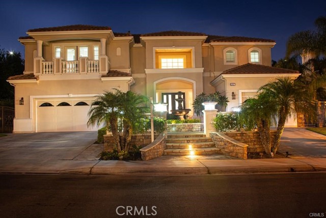 18857 Secretariat Way Yorba Linda, California One of the best quality home with tremendous amount of features with Elegance, Quality and Condition. It is extremely desirable floor plan offering Full Bedroom and Office/Library with 1.5 Baths downstairs. Circular Dual Staircases, back door stairs, Open Floor plan, Tiled entry with high end Chandeliers, Recessed lighting , Ceiling Fans, Breakfast nook, Powder room ,Speaker System, Central Vacuum system are only few features to mention. It has 3 Fireplaces with 4 zoned HVAC system and all this WITHOUT HOA. Large Kitchen Boasts granite counter tops, butler'spantry, walk in large pantry, 6 gas burner w grill, dual oven etc. Large master bedroom offers large bathroom as well with dual shower heads and large closets. Bonus room is perfect for in laws or Theater or for sports room. Downstairs Office/Library is very large and open. One of the balconies offer great views of the city lights etc. Very Spacious BACKYARD Offers many Fruit trees with Built in Barbeque, dual patios, large lighted fountains in the back and front. Perfect for Entertaining. 37 SunPower solar panels just installed this year. A few minutes to grocery stores, Award-Winning Yorba Linda High, and the new Yorba Linda Town Center!!