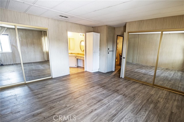 Two mirrored-door closets