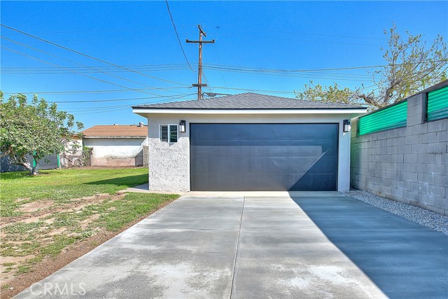 Garage / Newly Poured Driveway