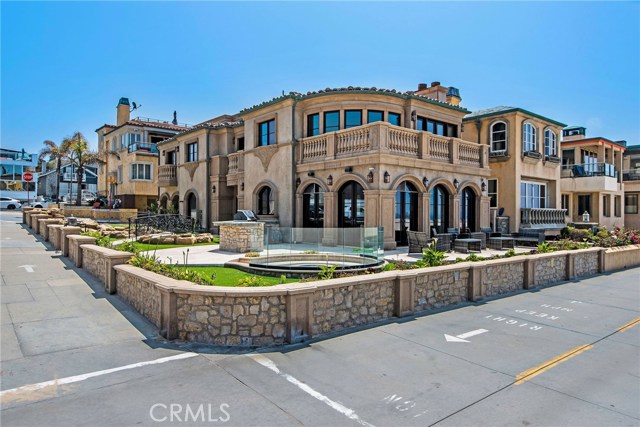 2340 The Strand Hermosa Beach, California Beachfront walk street corner locations do not come available very often, let alone on arguably the best part of The Strand. When they do, it's worth more than a look, it's time to make the move. This stunning home is ideally located between the Hermosa and Manhattan Beach Piers and both Downtown areas. The main floor opens to the expansive beachfront patio with fire-pit and outdoor kitchen ready for your gourmet bbq skills. The spacious side yard even features a mini lazy river! After a day swimming, sunning and playing at the beach, cozy up to a fireplace, or better yet, pop some popcorn and make it a movie night in the spacious movie theater with comfortable reclining seats. Los Angeles Magazine has named Hermosa an "outstanding coastal town' praising many of our businesses and shops. From traditional surf and turf, to more exotic cuisines, from comedy to jazz, Hermosa Beach has many fine dining and entertainment destinations from which to choose. But if you want to venture out, visit all of the famous attractions Los Angeles has to offer! Live a little, slow down and enjoy the beach life!