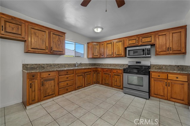 Big kitchen with room for a table and chairs.