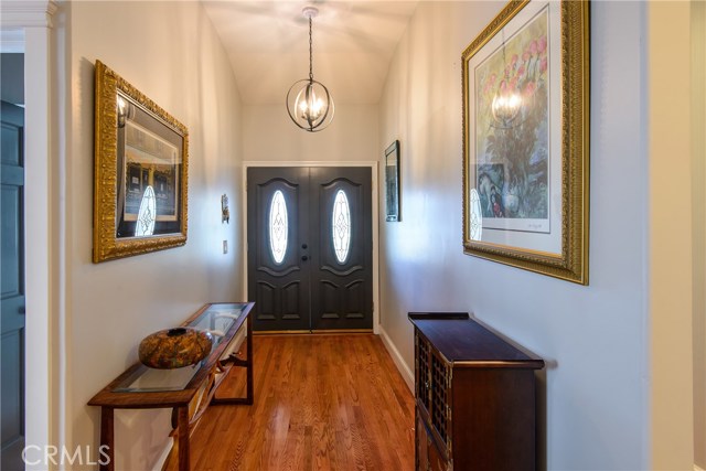 Leaded Glass doors open into the large entry!