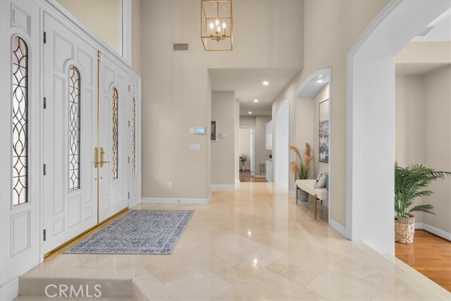 Foyer with soaring ceilings