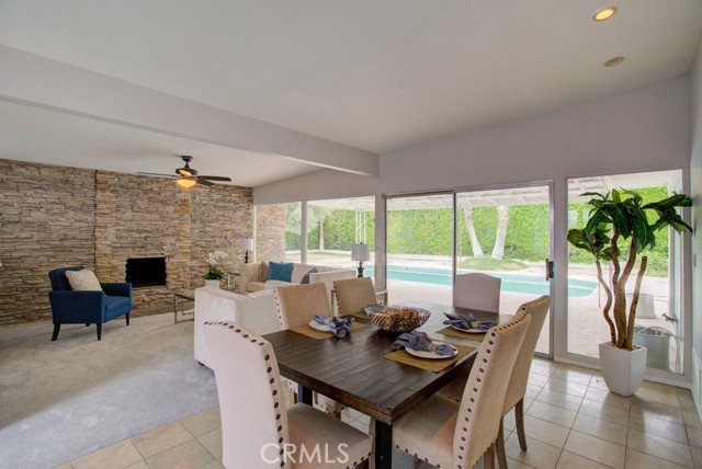 2287 E Hildy Lane Palm Springs, California This wonderful single story pool home provides the Palm Springs Lifestyle located in the sought after neighborhood of Desert Park Estates. Step into this gorgeous remodeled 3 bedroom, 2 bathroom home featuring an open floor plan boasting plenty of natural light beaming through the many windows. Upon entry you are greeted by the open and inviting main living areas with limestone floors and beautiful views of the pool in the backyard, perfect for entertaining. The family room is accented by a stacked stone fireplace with the finish expanded throughout the back wall. You'll love the remodeled kitchen equipped with granite counter tops, a black stainless steel sink, stainless steel appliances and plenty of upgraded cabinet space for all of your organizational needs. The master bedroom has direct access to the backyard and showcases a spacious en-suite with dual sinks and a separate upgraded shower. All bedrooms have ceiling fans installed, perfect for those warm summer nights. Both bathrooms have been remodeled with granite counter tops, upgraded cabinets, 24x48 tile walls and new fixtures. Enjoy the California sunshine in the backyard complemented by a large private pool and covered patio. Conveniently located near plenty of shopping and dining options. Do not miss this opportunity, schedule your private showing today!