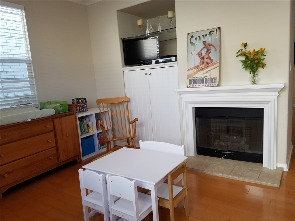 Family room off kitchen with fireplace