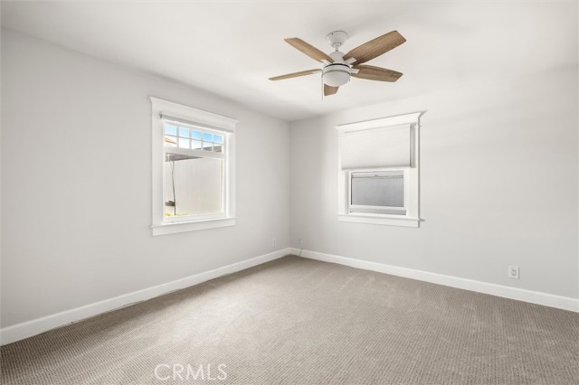 Bedroom 2. Dual pane windows and cellular shades.