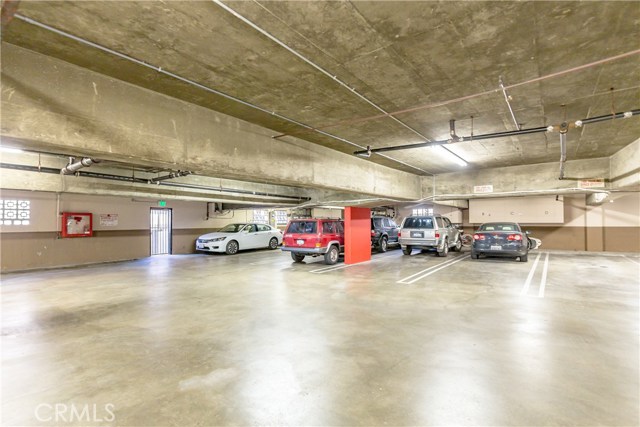 Secured parking garage with 2 designated parking spaces all within a well maintained building.