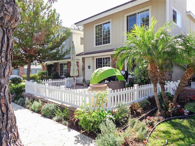 Front of duplex showing the nice sized patio as a great outside living area.