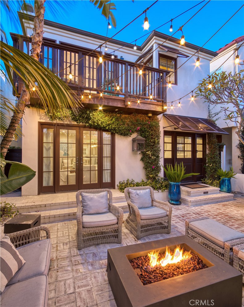 It’s time to live your best life!  A coastal gem designed with family in mind, this decorator perfect home is situated mid-block on the best flat walkstreet in all of Manhattan Beach.  This home has space for everyone, featuring SIX exquisite bedrooms plus a bonus media room off the bedrooms and a third floor office with lounge area and private deck.  The gorgeous primary suite has tons of natural light, a large walk-in closet fit for a queen and a custom primary bath with handmade tiles. The gourmet kitchen is a dream with Sub-Zero fridge and freezer towers that frame a commercial grade Wolf range, Calcutta Gold countertops, Paul Ferrante custom island pendants, icebox latch pulls, prep sink, wine fridge and a banquette table with built-in seating for 8.  Other features of this gorgeous home include a pinterest-worthy laundry room with butler’s staging area and folding room, dual zoned A/C, a spa-like outdoor shower and a large mudroom with tons of storage adjacent to a back patio with a private outdoor dining area and BBQ.  Striking the perfect balance between indoor and outdoor living, the front patio flows from the living room and has plenty of space to lounge and entertain, complete with fire pit, outdoor TV and dining table for 10.  Perfectly situated just 3 blocks to the beach and 2 blocks to all of the fabulous shops and restaurants in downtown Manhattan Beach, don't let this one get away!