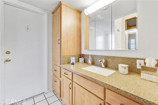 Bath #3 Master Bedroom Vanity and Storage cabinets with door to exterior patio