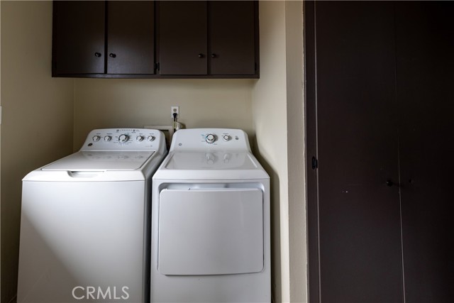 Laundry Area with Storae and half bath