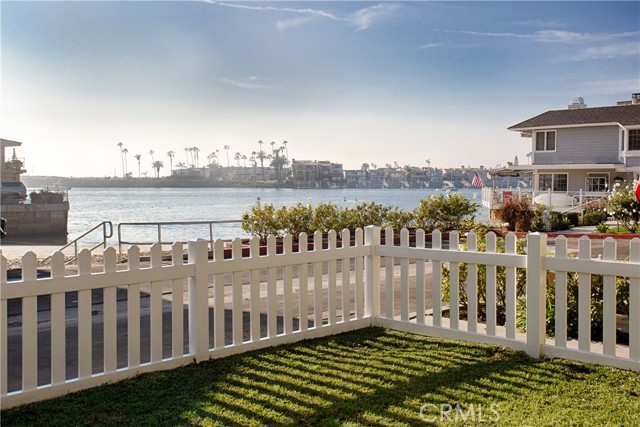 2708 Cove Street Corona del Mar, California Sited on the secluded Corona del Mar beach of China Cove, this stylish 2-bedroom home offers idyllic seaside living with coastal furnishings and sprawling water views. Along with an open floorplan, soaring ceilings – highlighted by skylights – and light wide plank flooring, an expansive ambiance is present throughout. A darling fireplace connects the dining room and kitchen – fully equipped with dishwasher, ample cabinetry and eating/prepping bar. Glass pocket doors are a focal point in the open living room, providing views of the sandy beach, tranquil waters, and front yard replete with white picket fence. Live the Corona del Mar Lifestyle on the beach with close proximity to the world-class shopping, dining and beaches the Village offers.