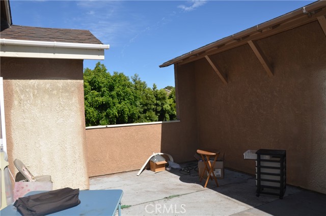 Private patio above garage