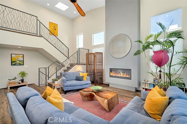 Mid-level livingroom with stairs to loft