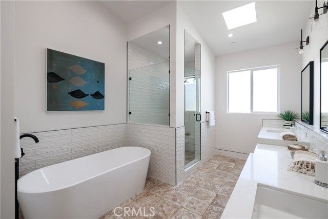 Master Bath with Replenishing Soaking Tub and Walk-In Shower