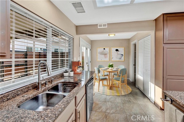 Kitchen toward breakfast nook.