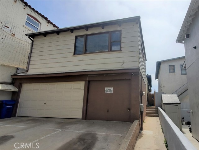 Rear Unit above the two car and one car garage