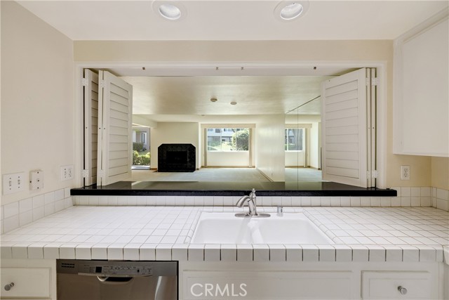 Breakfast bar between kitchen and main living or dining area