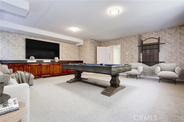 Virtually staged as a Game Room
