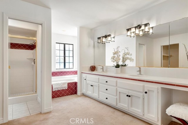 main bathroom with 2 closets one extra large walk-in
