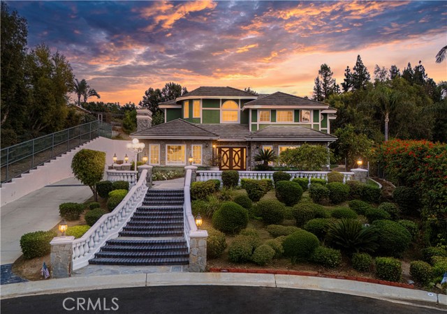 Luxury newly renovated custom house with 5 bedrooms (1 bedroom downstairs), 4.5 bathrooms and 3-car garage located on a cul-de-sac lot in a gated community in Anaheim Hills with a large lot of 24000 SF! It looks like a palace from outside especially from elegant staircase formal entry.The house has just been re-piped,and the fire protection system also has been renewed. 

The single family residence has a gorgeous open floor plan on the first floor.The front door is luxury double swing door. When you come in, An entrance  high ceiling design will give you much more light and space and connect the first floor and the second floor. Living room and dining room are just on the two sides of the entrance high ceiling.  The kitchen, breakfast room, and family room make a great open space, and connect to large backyard full of fruits and flowers through cozy sun room. Upgraded kitchen with quartz counters and new appliances makes the life full of pleasure. A half bathroom, laundry, and a suite on the first floor make the house functional. Large new white ceramic tiles covering the first floor contribute elegant life experience in every corner.

The second floor features four spacious bedrooms with new wood floor. Master suite, guest suite, another two guest bedrooms and a full bathroom give enough rooms for a big family. 

Parks, hiking trails & golf course are nearby, Easy access to 91 Freeway, Imperial Hwy & Yorba Linda Blvd. Great schools service this community. Canyon Rim Elementary School, EI Rancho Charter School and Canyon High School all are grated 9 by www.greatschools.org.