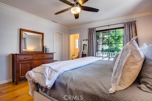 Primary bedroom with private balcony.