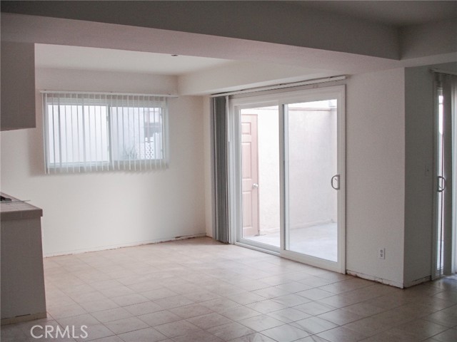 The dining area after refurbishing.  The slider leads out to a private patio.