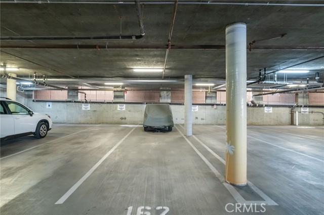 Two parking spaces in covered/gated secure parking garage.